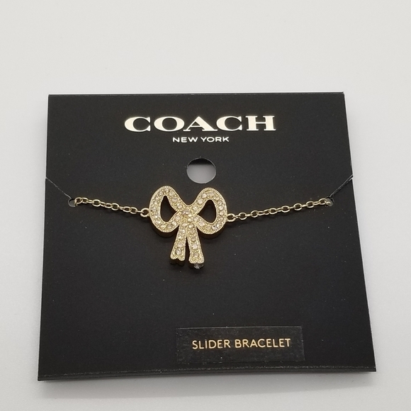 NWT Coach pave bow slider bracelet gold and clear - Picture 1 of 3